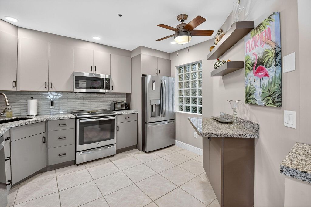 Photo of 5157 Floria Way #F, Boynton Beach, FL 33437 (MLS # R11110539)