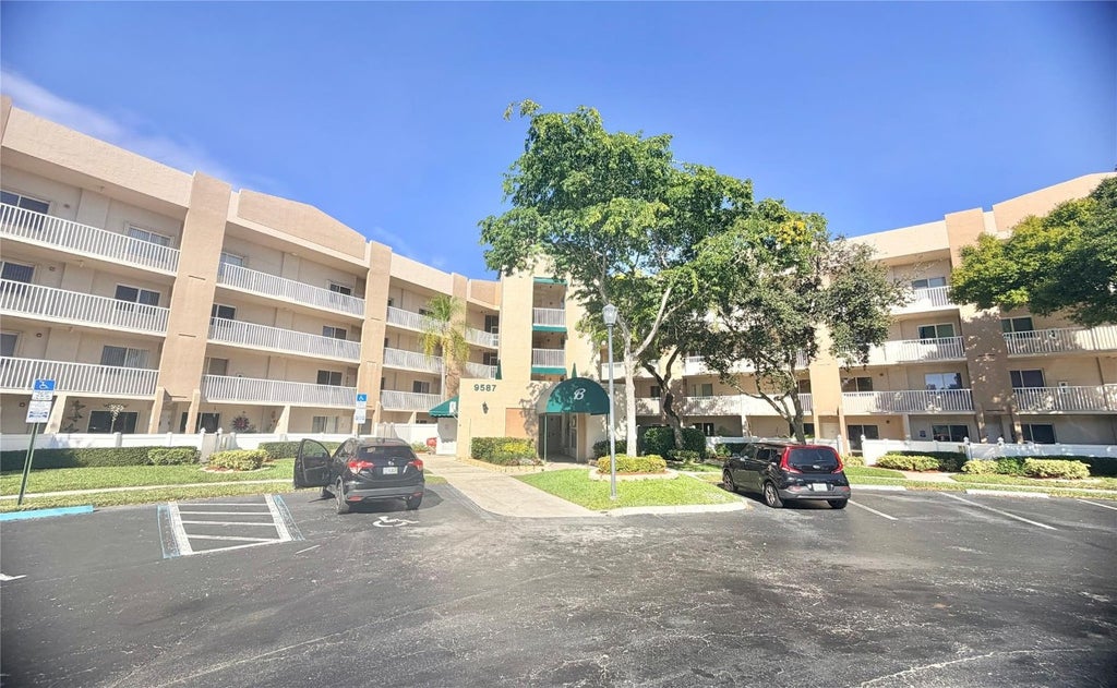 Photo of 9587 Weldon Circle #B204, Tamarac, FL 33321 (MLS # F10532549)