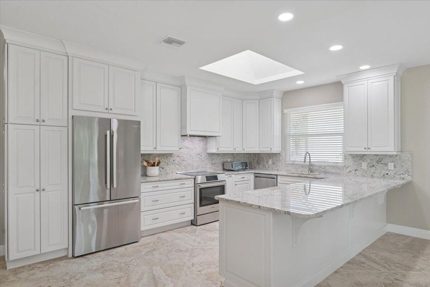 GORGEOUS MOVE-IN READY HOME WITH GOLF VIEWS! Nestled on a beautifully landscaped 1/2-acre lot overlooking the 2nd hole of the prestigious Legacy Golf Course, this meticulously updated home offers luxury, comfort, and peace of mind. Step inside to discover a bright, modern interior featuring 24x24 porcelain tile flooring throughout, a 2018 metal roof, PGT WinGuard impact windows, and a hurricane-rated garage door--every detail designed with quality and durability in mind. The chef's kitchen is a true showstopper, featuring Bosch appliances, granite countertops, custom cabinetry, with an adjacent dining area and family room, perfect for entertaining. The living room offers a more formal gathering space including bar area with wine cooler all with breathtaking views of the golf course. Three