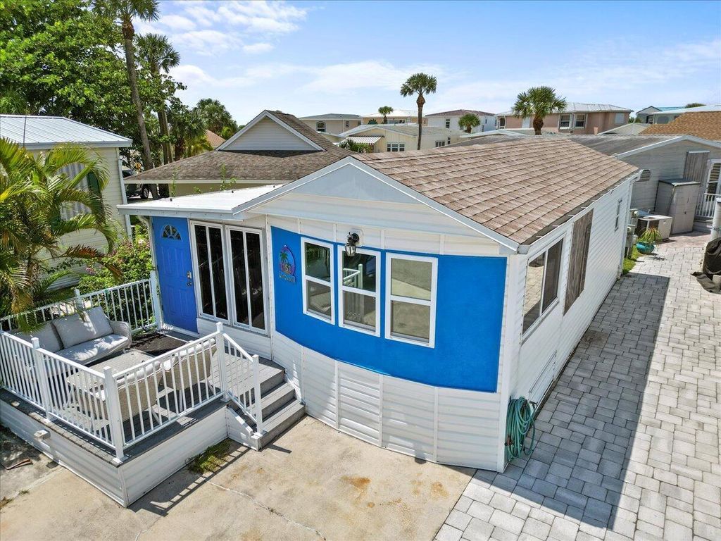 Photo of 1161 Nettles Boulevard, Jensen Beach, FL 34957 (MLS # R10917362)