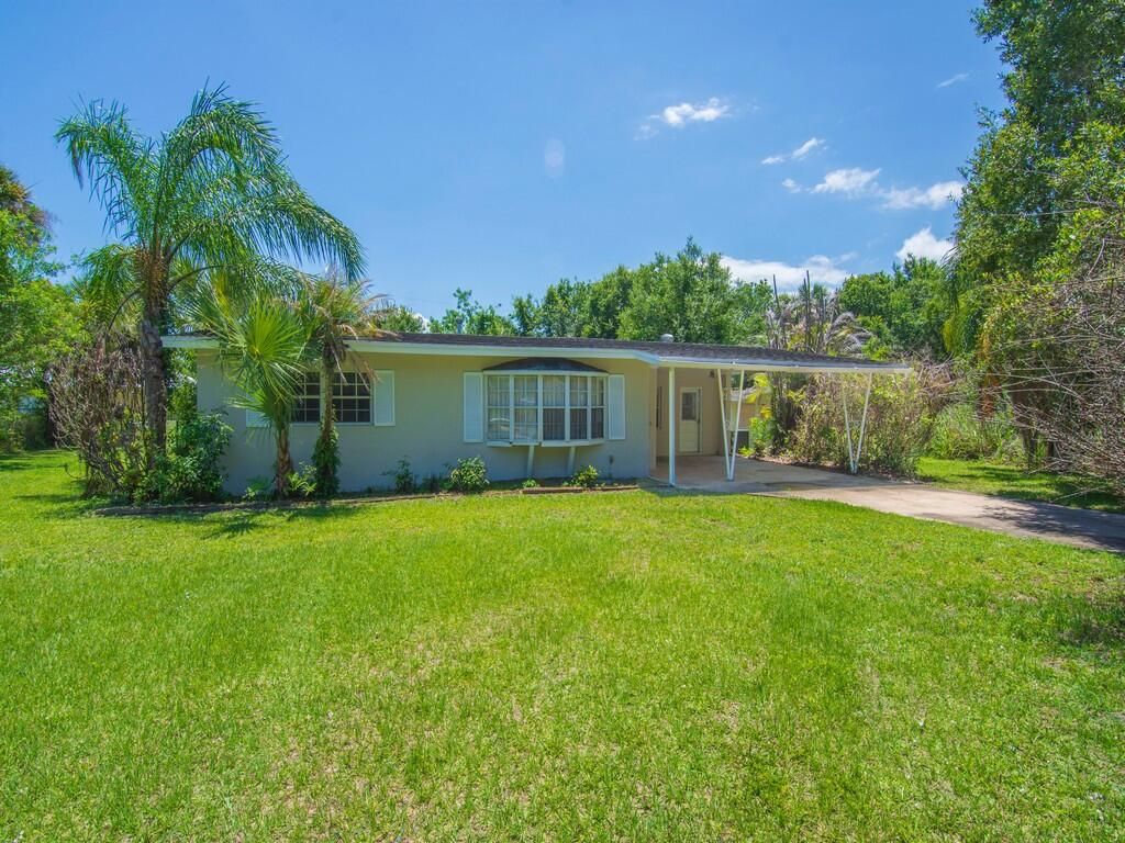 Photo of 7907 Lockwood Drive, Fort Pierce, FL 34951 (MLS # B26031119)