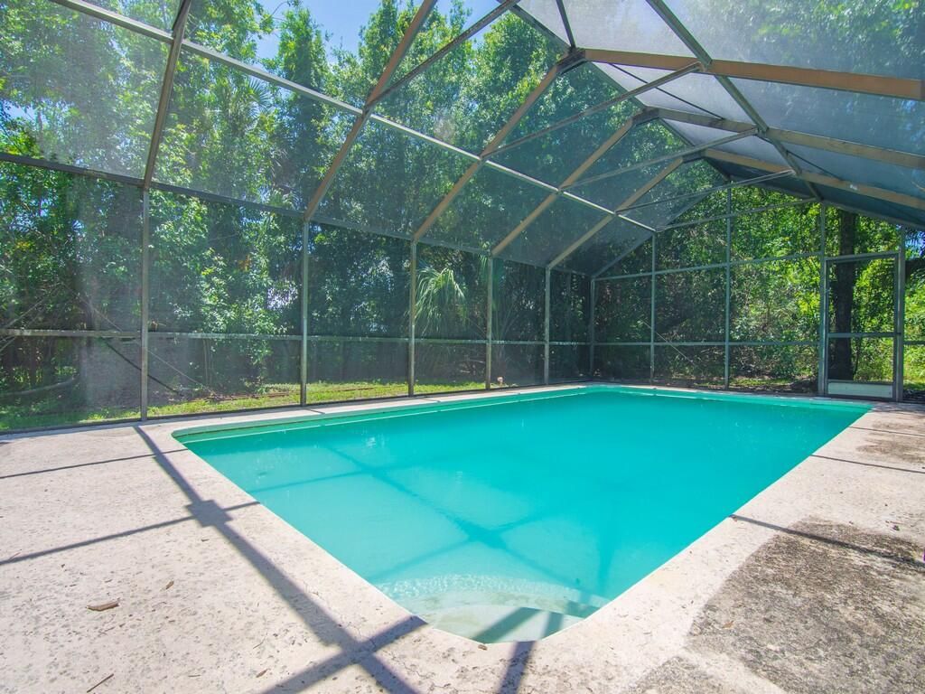 Photo of 7907 Lockwood Drive, Fort Pierce, FL 34951 (MLS # B26031119)
