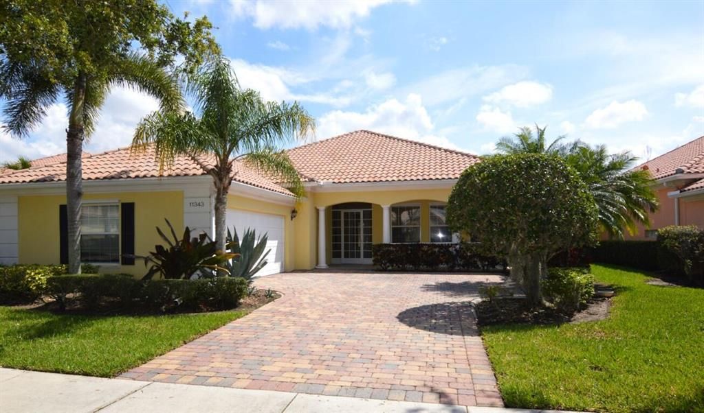 Photo of 11343 SW Olmstead Drive, Port Saint Lucie, FL 34987 (MLS # R10787089)