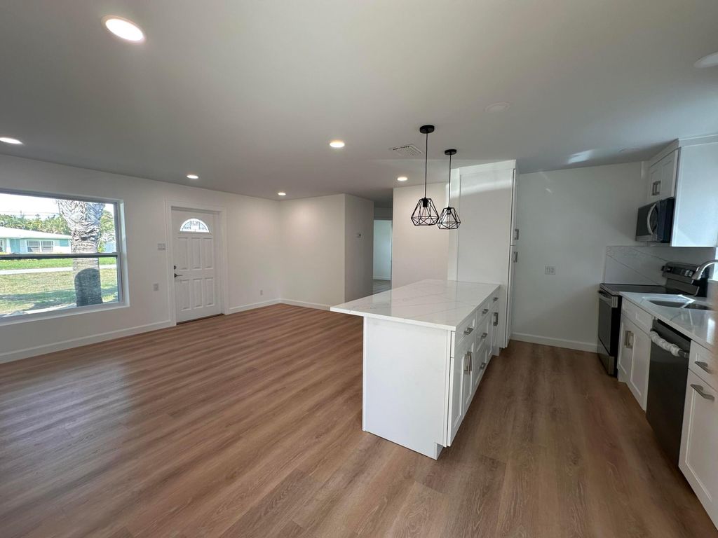 Photo of 1612 NE South Street NE, Jensen Beach, FL 34957 (MLS # R11065155)