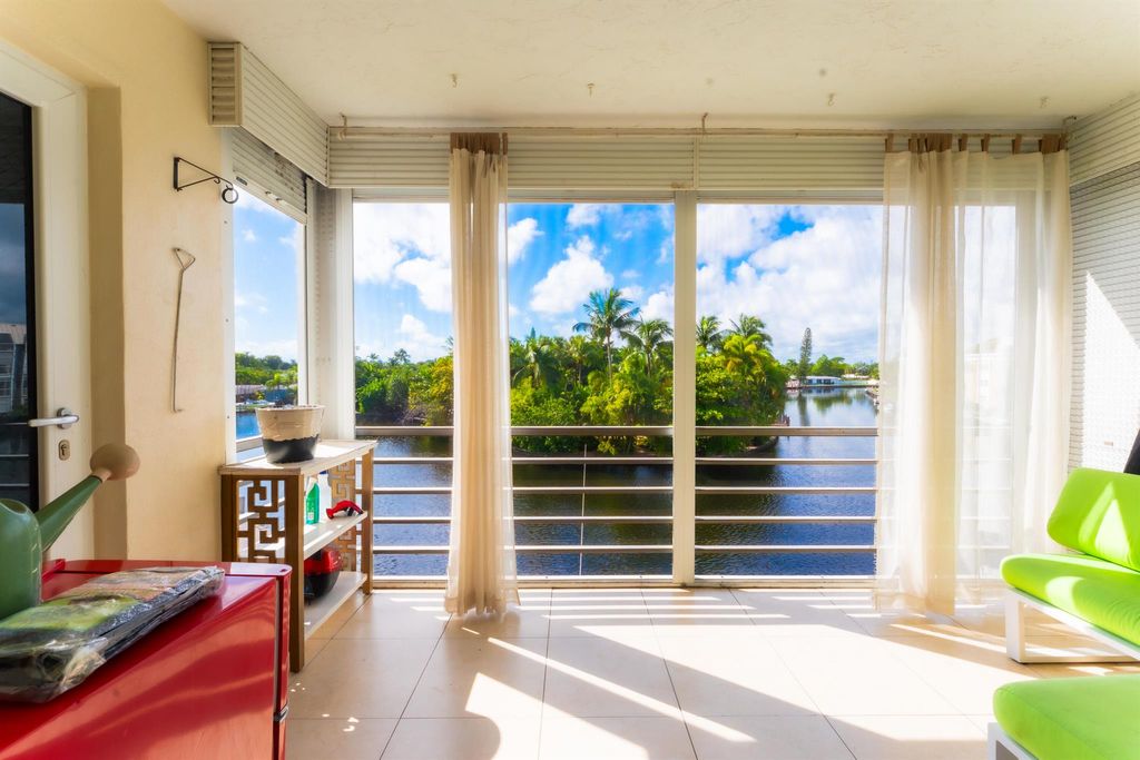Photo of 3010 NE 16th Avenue #303, Oakland Park, FL 33334 (MLS # R11132511)
