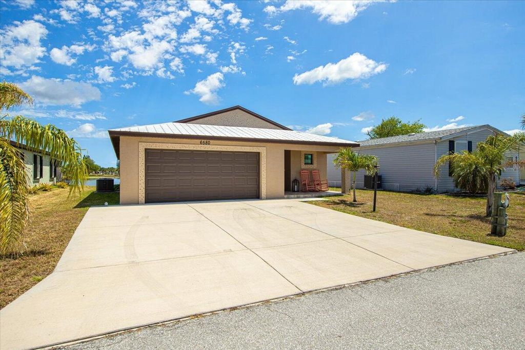 Photo of 6580 Dulce Real Real, Fort Pierce, FL 34951 (MLS # R10978044)