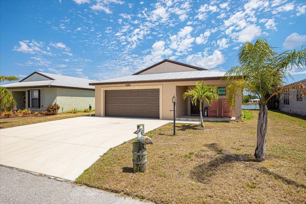 Photo of 6580 Dulce Real Real, Fort Pierce, FL 34951 (MLS # R10978044)