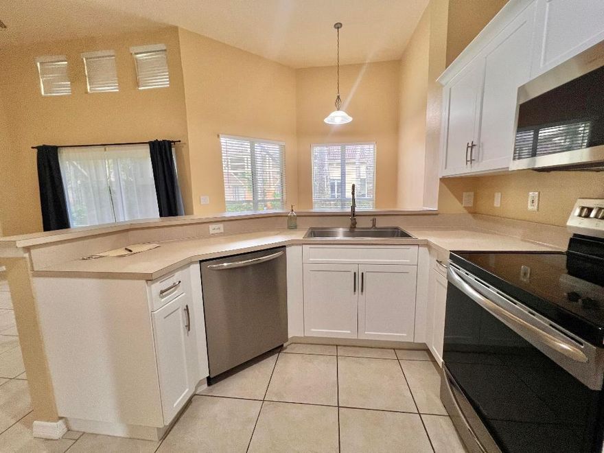 FOR RENT - Gorgeous Two-story townhome- 2 master bedrooms. Each with its own full bath, walk-in closet - linen closet. Open floor plan with volume ceiling and windows throughout. Stainless Steel appliances- Spacious kitchen and open dining area . Ample Storage- Impact glass windows-Enjoy Resort-style amenities Palm Lake Condo- gated community including  pool, spa- fitness center, clubhouse, and tennis court.  Conveniently located in the heart of West Palm Beach. Minutes to area attractions, Palm Beach outlet, Beaches, I95 & turnpike. Pet friendly - All Ages - 620 + CS per Association . Water included in the rent. A MUST SEE !