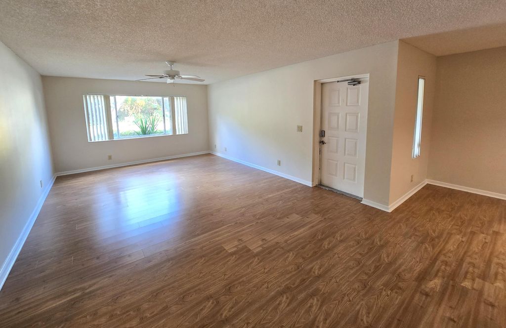 Photo of 13810 Oneida Drive #B-1, Delray Beach, FL 33446 (MLS # R11142836)