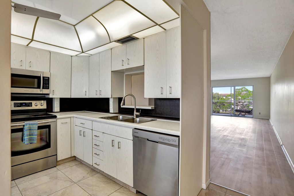 Photo of 2405 Antigua Cir #D4, Coconut Creek, FL 33066 (MLS # F10436696)