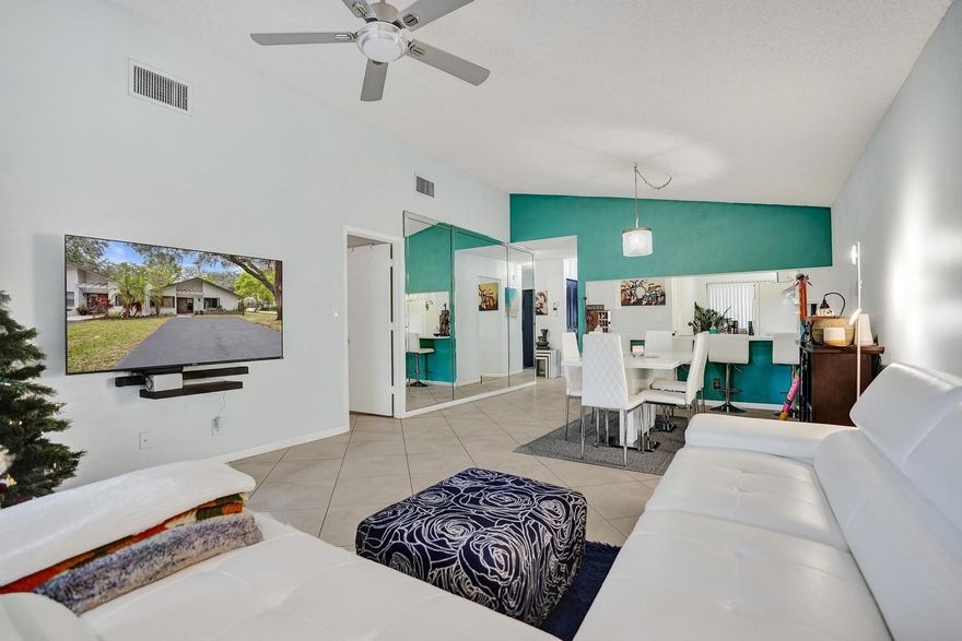 An intimate, park-like enclave surrounded by lush green space and tranquil golf course views. This centrally located Delray Beach home is just minutes from the beach, downtown, the Tennis Center, Arts District, dining, shopping, and everyday conveniences. Features include a newer A/C (2020), stainless steel stove and hood (2024), freshly painted kitchen counters with new hardware, and a built-in doggy door in the slider. The roof was replaced in 2015. Residents enjoy a clubhouse with Wi-Fi, a heated pool, a picnic area, and tennis courts. With friendly neighbors and a serene natural environment, Shadywoods remains one of Delray's most desirable places to call home.