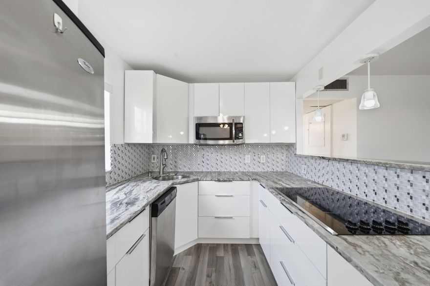 Welcome to 97 Saxony C, a spacious 2-bedroom, 2-bath TRUE corner unit located on the ground floor in the highly desirable King's Point Golf & Country Club, a vibrant 55+ community. **BRAND NEW AC 2026** This beautifully remodeled condo features a renovated kitchen and bathrooms, new flooring throughout, and the convenience of an in-unit washer and dryer. Enjoy easy ground-floor living with abundant natural light that only a corner unit can offer. King's Point provides an exceptional lifestyle with resort-style amenities including indoor and outdoor pools, tennis courts, billiards, fitness centers, craft and sewing rooms, on-site dining, and a community shuttle.