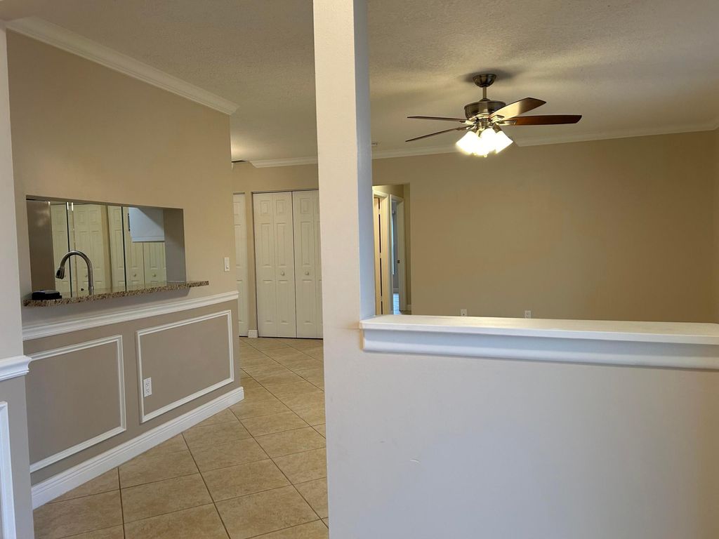 Photo of 4077 NW Cinnamon Tree Circle, Jensen Beach, FL 34957 (MLS # R10943430)