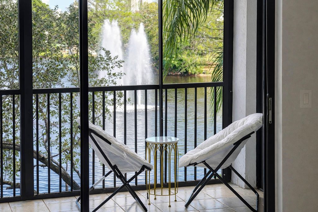 Photo of 2334 S Cypress Bend Drive #202, Pompano Beach, FL 33069 (MLS # B26004037)