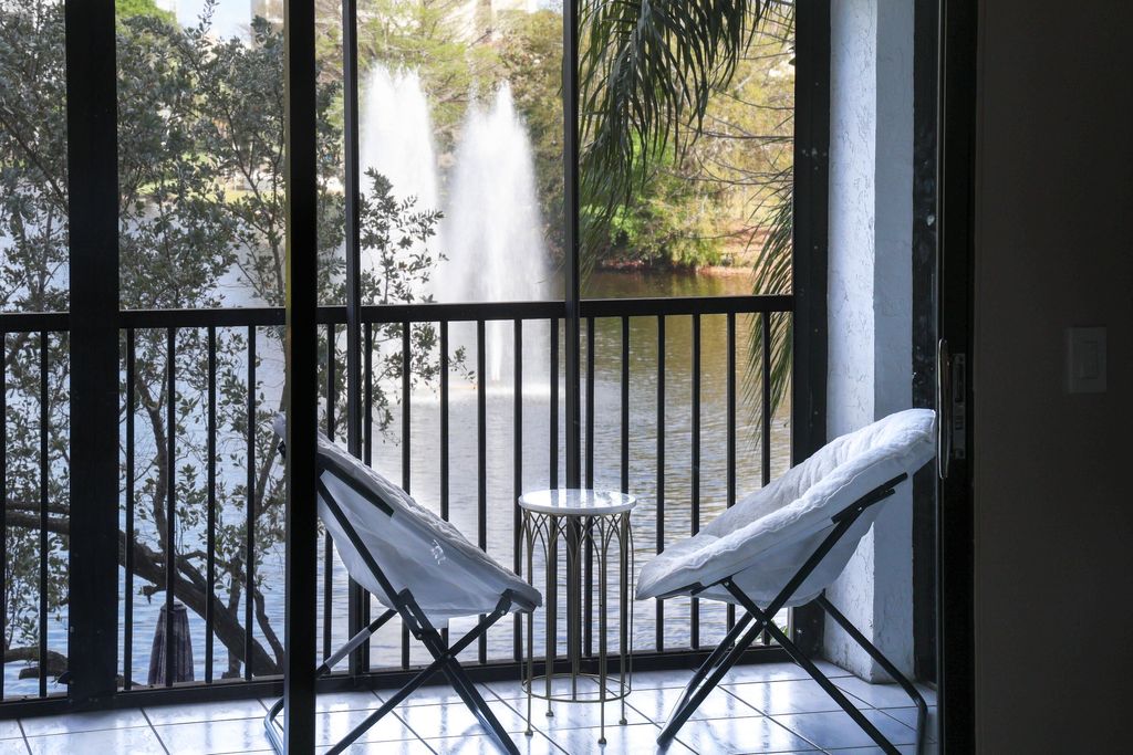 Photo of 2334 S Cypress Bend Drive #202, Pompano Beach, FL 33069 (MLS # B26004037)