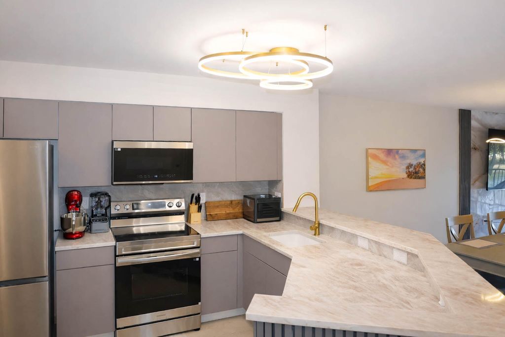 Photo of 2334 S Cypress Bend Drive #202, Pompano Beach, FL 33069 (MLS # B26004037)