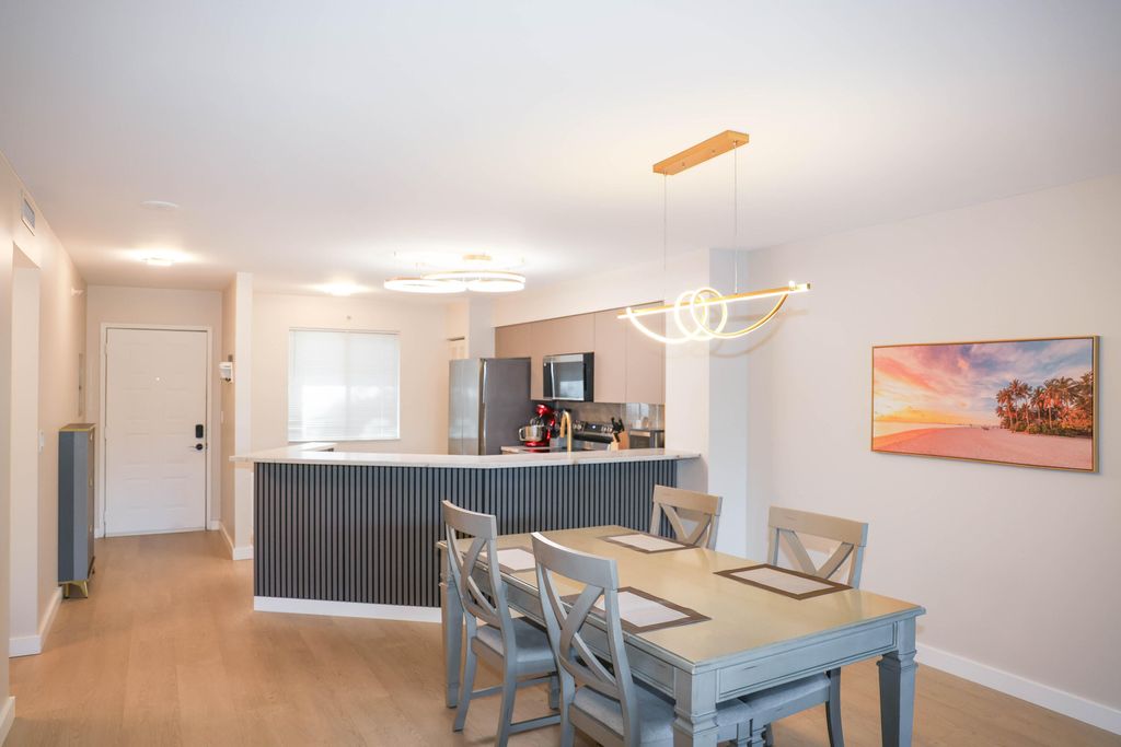 Photo of 2334 S Cypress Bend Drive #202, Pompano Beach, FL 33069 (MLS # B26004037)