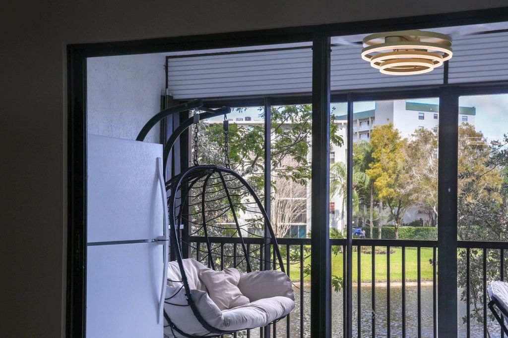 Photo of 2334 S Cypress Bend Drive #202, Pompano Beach, FL 33069 (MLS # B26004037)