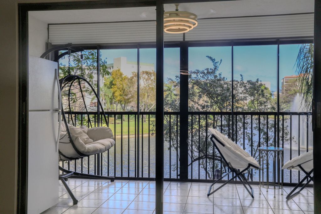 Photo of 2334 S Cypress Bend Drive #202, Pompano Beach, FL 33069 (MLS # B26004037)