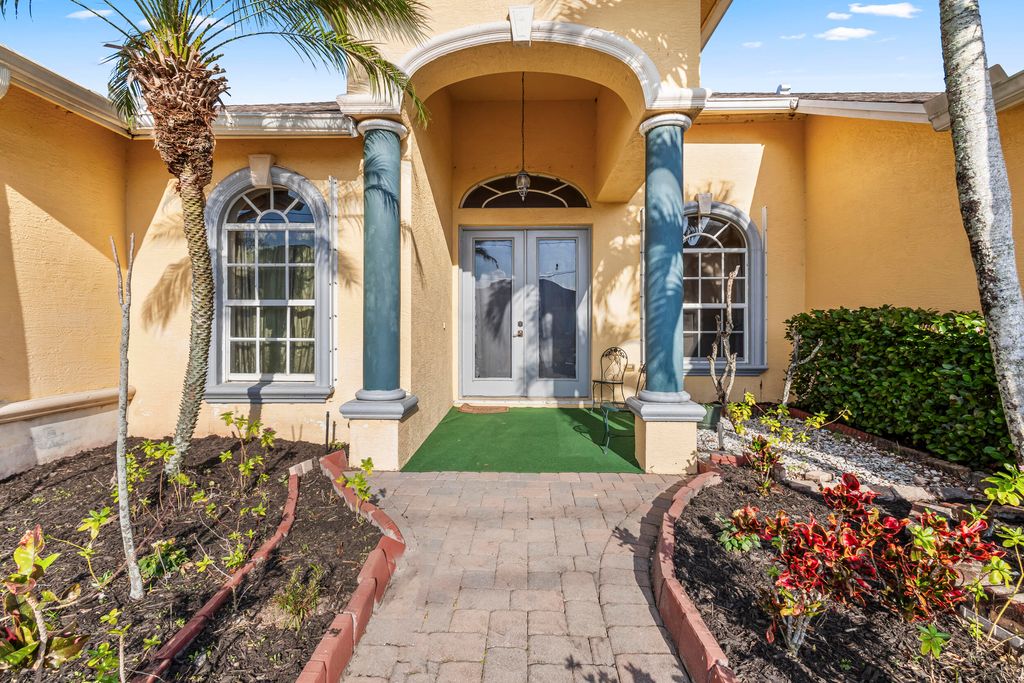 Photo of 5391 NW Akbar Terrace, Port Saint Lucie, FL 34953 (MLS # R11063275)