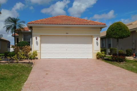 Photo of 810 NW Rutherford Court, Port Saint Lucie, FL 34983 (MLS # B26019509)