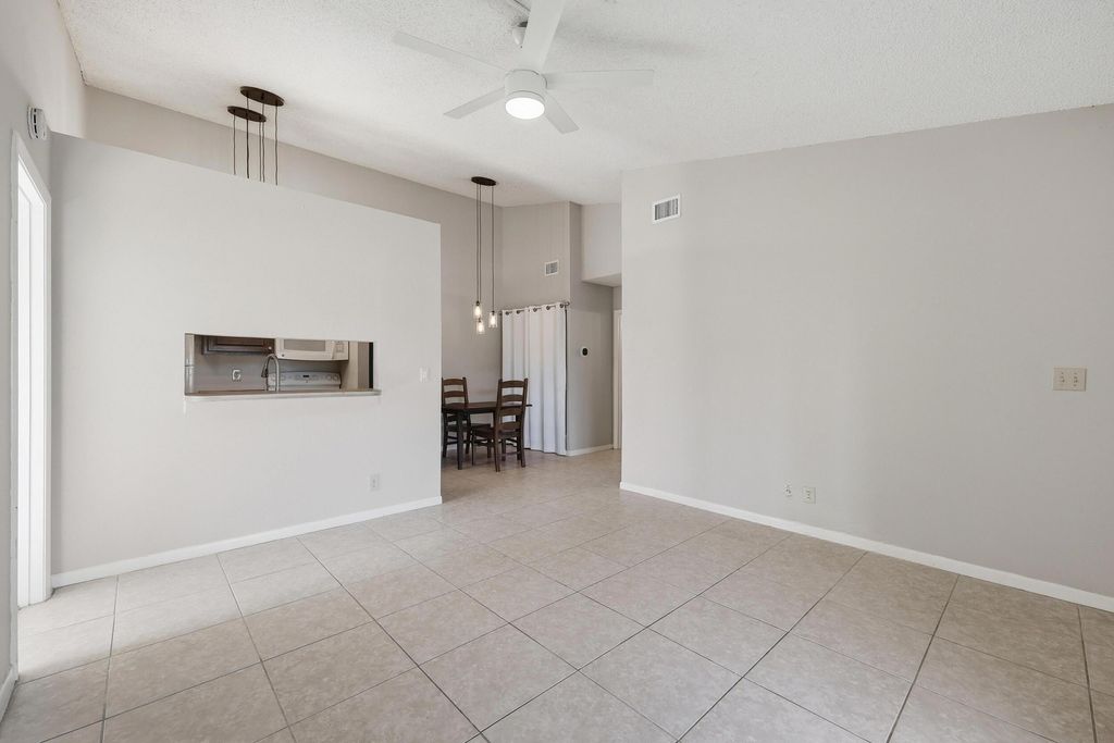 Photo of 6286 Chasewood Drive #E, Jupiter, FL 33458 (MLS # B26006452)