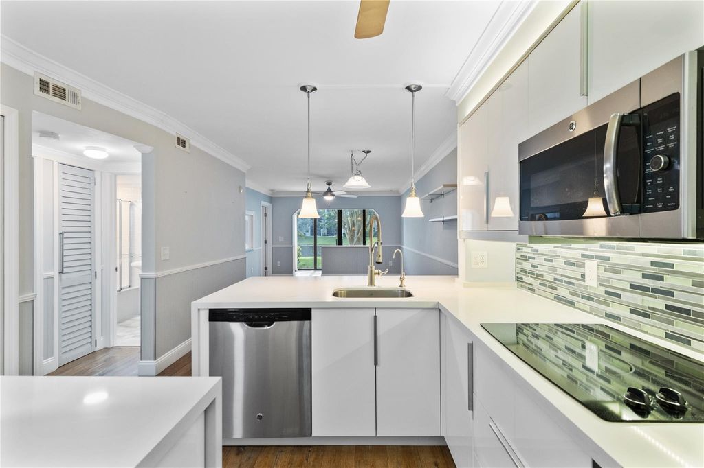 Photo of 2236 N Cypress Bend Drive #101, Pompano Beach, FL 33069 (MLS # F10455236)