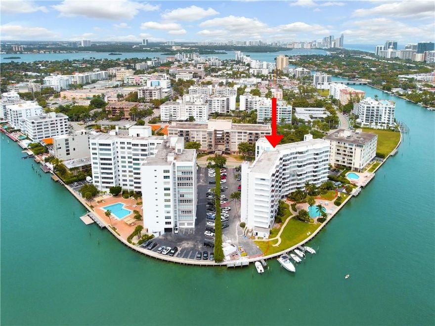 Amazingly well-located residence in one of the most iconic buildings in Bay Harbor Islands. The Mediterranean, designed in the Modernism (MiMo) style by famous architect Herbert Mathes, has some of the best views of Indian Creek Lake. With its southeastern perspective, residence 403 has been reconfigured back to its original layout offering two private bedrooms. The condo also features new stainless steel appliances, an extra storage room locker, a serene pool area, a kayak launch and more. The Mediterranean has just completed a multi million dollar restoration to its 1950's MiMo glory with all fees and assessments paid by the seller.