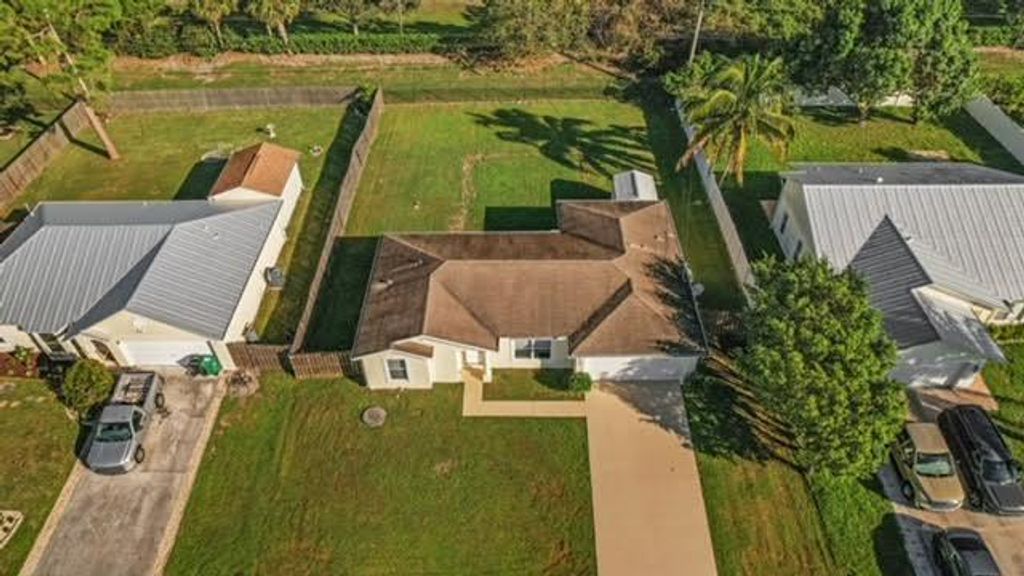 Photo of 2131 SW Janette Avenue SW, Port Saint Lucie, FL 34953 (MLS # R11154899)