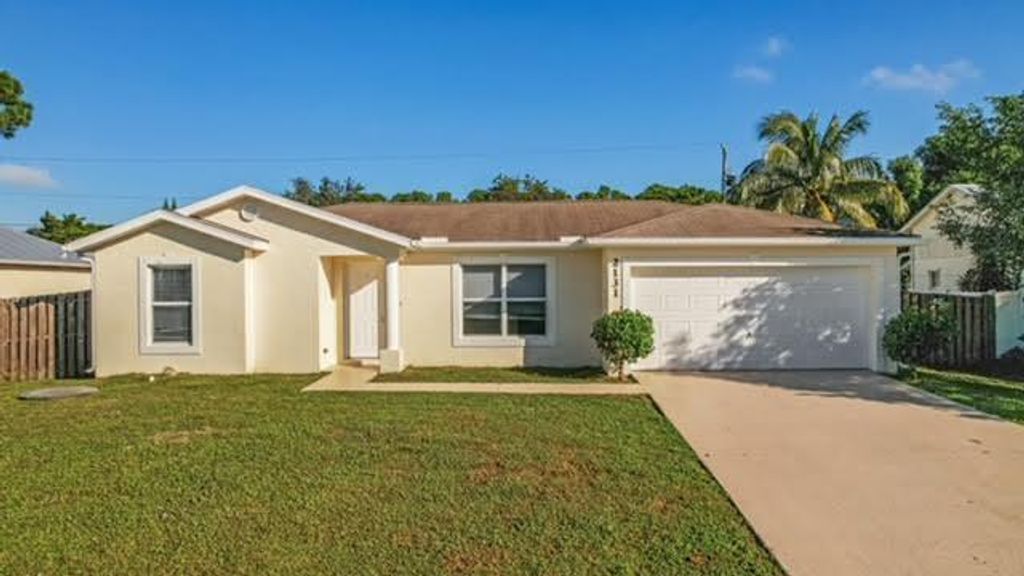 Photo of 2131 SW Janette Avenue SW, Port Saint Lucie, FL 34953 (MLS # R11154899)