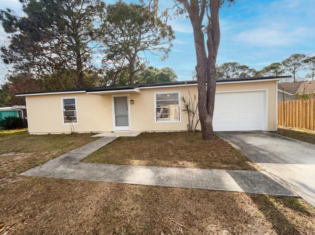 Photo of 1118 SE Proctor Lane, Port Saint Lucie, FL 34983 (MLS # R11168011)