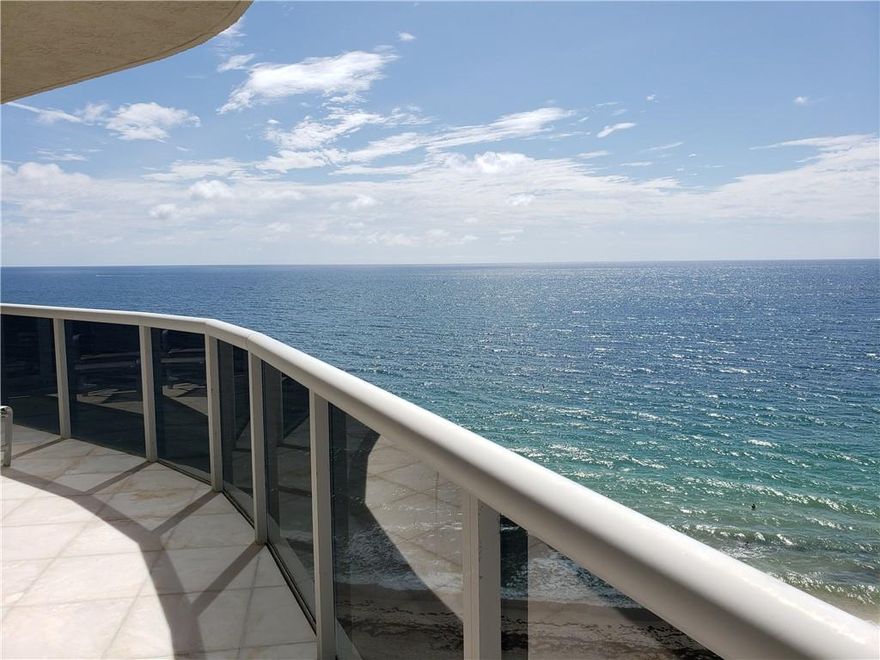 SE CORNER..L'HERMITAGE II..3000 sq ft PLUS a huge wrap-around terrace..views of ocean, coastline and pool deck ...currently 2 bedrooms with 2 dens..can be 4 bedrooms..beautifully appointed with built-ins, renovated kitchenbaths and windows. 2 SELF PARKING garage spaces. Resort-like complex with concierge, valet, spa, tropical poolarea with cafe , 2 clay (har-tru) tennis courts, pet parks..NOTE THAT 2 PETS ANY SIZE , ok