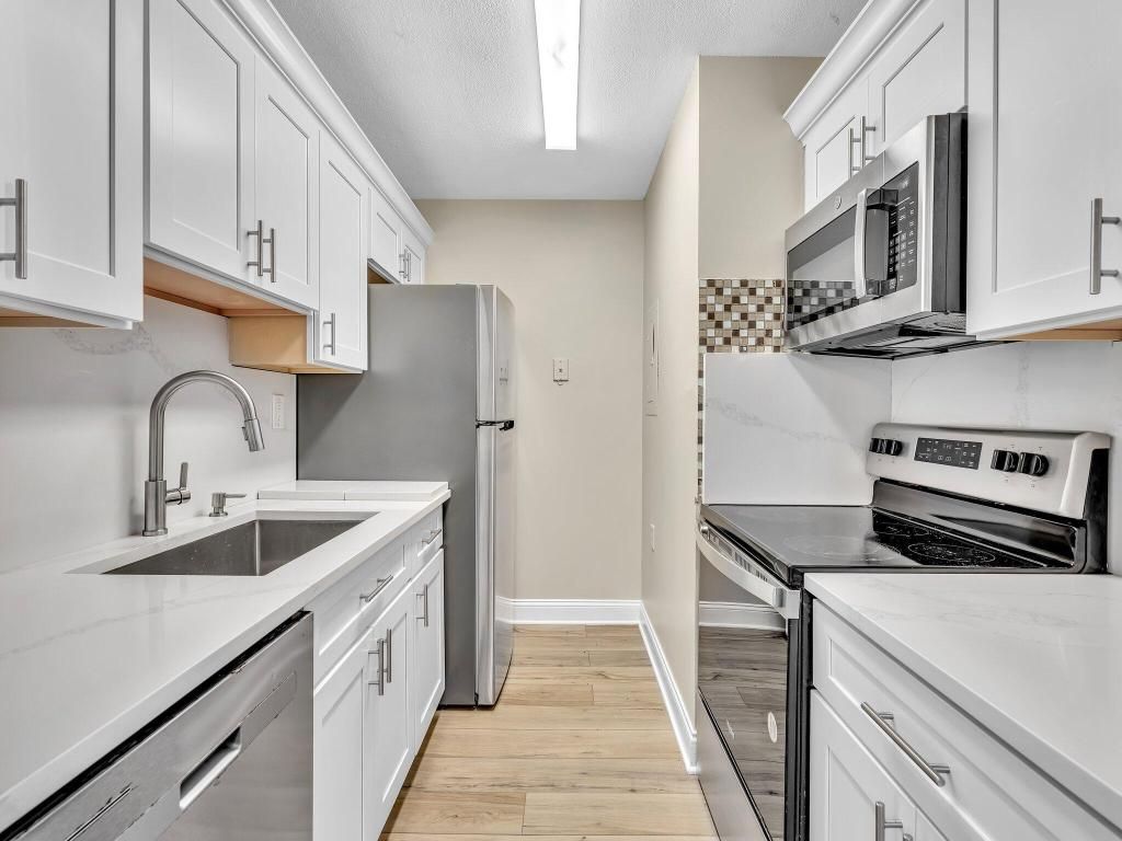 Photo of 1163 Lake Terry Drive #N, West Palm Beach, FL 33411 (MLS # R11148354)