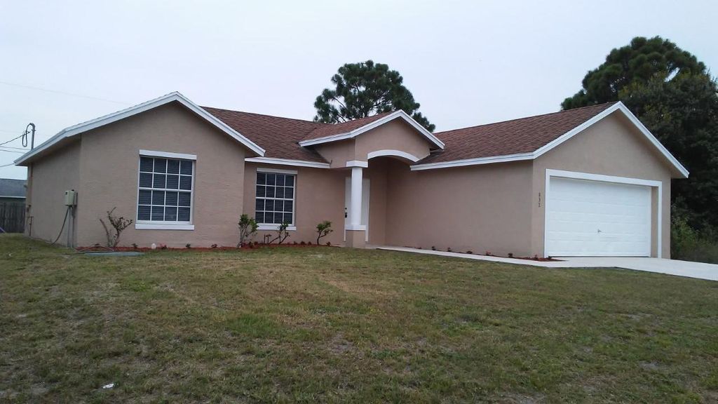 Photo of 832 SW Duncan Terrace, Port Saint Lucie, FL 34953 (MLS # R11142283)