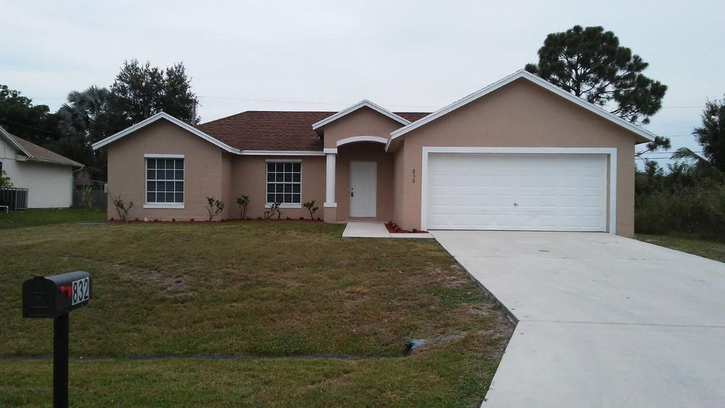 Photo of 832 SW Duncan Terrace, Port Saint Lucie, FL 34953 (MLS # R11142283)