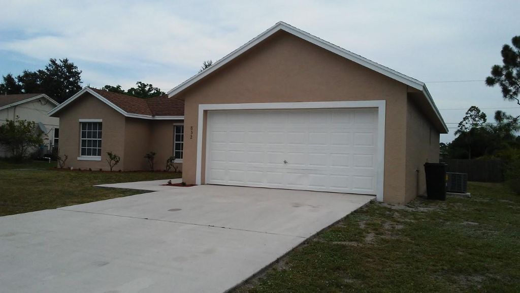 Photo of 832 SW Duncan Terrace, Port Saint Lucie, FL 34953 (MLS # R11142283)
