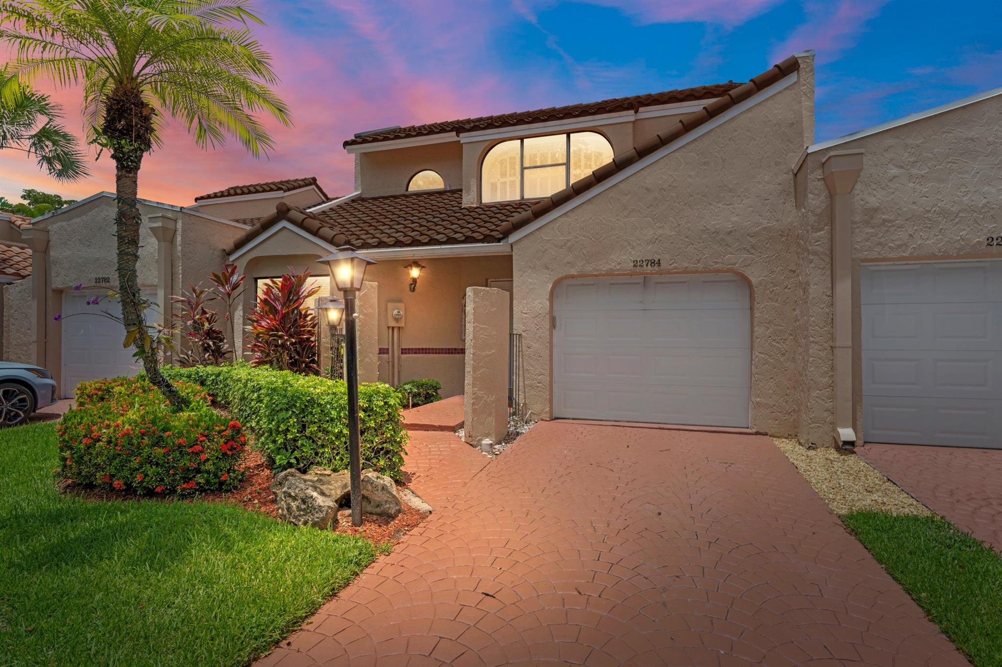 ABSOLUTELY GORGEOUS TOWNHOUSE | PRESTIGIOUS BOCA POINTE | QUICK WALK TO POOL | BREATHTAKING LAKE VIEWS | Bright Open Floor Plan | LED Recessed Lighting | Impressive Vaulted Ceilings | Wet Bar | Fireplace | Eat-In Kitchen with Center Island/Bar | Granite Counters | Wood Cabinets | S/S Appliances | Private Balcony | 2 Primary Bedrooms | Large Walk-In Closets | En-suite | Dual Sink Vanity | Jacuzzi Tub | Florida Room | 1-Car GA Plus Storage | Paver Driveway | Guest Parking | Immaculate Manicured Landscaping | Resort-Like Amenities Offerings a Clubhouse | Pool | Sundeck | Gazebo | Great Boca Raton Location Minutes to Beach, FAU, Mizner Park & Delray Beach Atlantic Ave | Top A+ Rated Schools | ROOF 2007 | AC 2022 | WH 2015 | PRESENT ALL OFFERS!