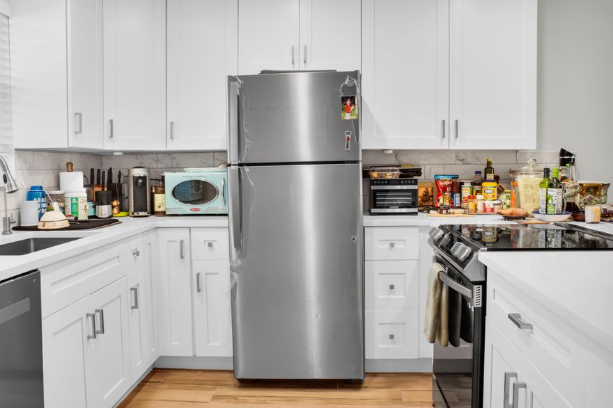 WOW – First-Floor, Rarely Available!Completely remodeled 2BR/2BA in desirable Lighthouse Point, just minutes from the beach — east of Federal Hwy off Sample Road. Inside: all-modern, contemporary open-concept layout with dropdown lighting, brand-new kitchen with new appliances, marble baths, impact windows, smart A/C, 6 closets, and a screened patio with serene courtyard and pool views. Unlike many properties, Lighthouse Terrace has over $575K in reserves, and the assessment is already halfway completed, giving you peace of mind and comfort that your home will feel like new. (Seller is paying the assessment!) There is a 50 YEAR ASSESSMENT that payments begin in August - will be paid by SELLER at Closing IN FULL...