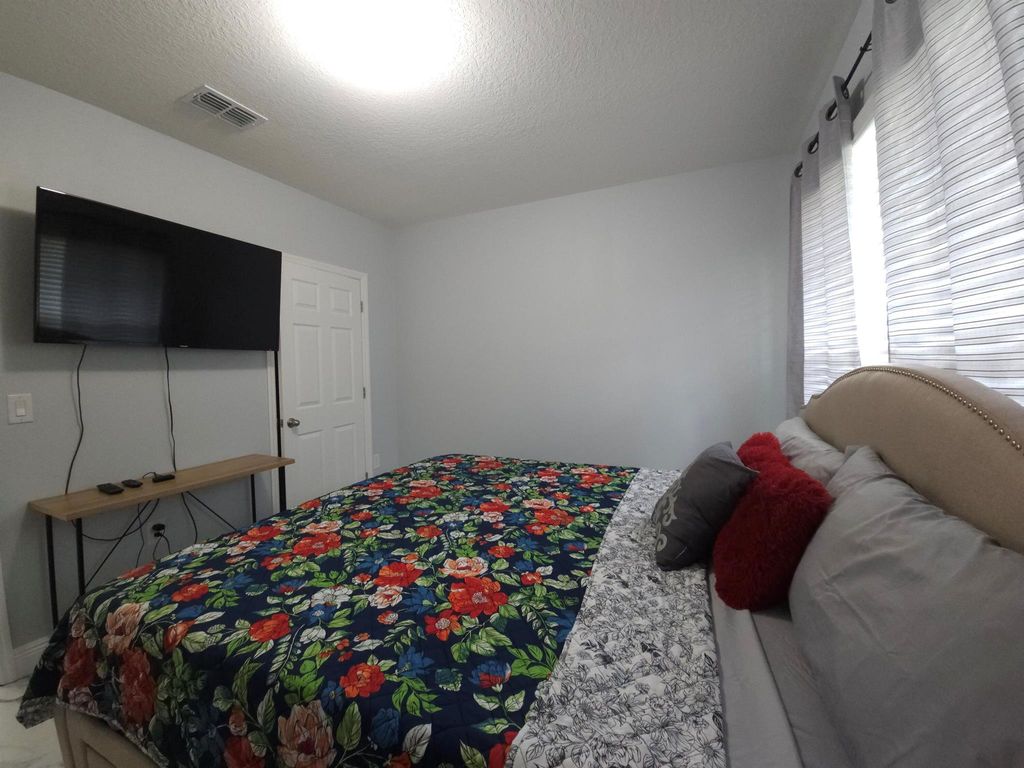 Photo of 672 SW Sarazen Avenue, Port Saint Lucie, FL 34953 (MLS # R11111727)