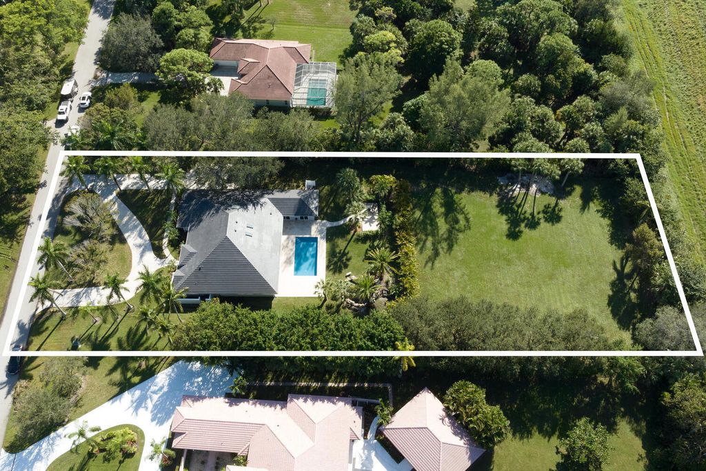 Photo of 8281 Man O War Road, Palm Beach Gardens, FL 33418 (MLS # R10938697)