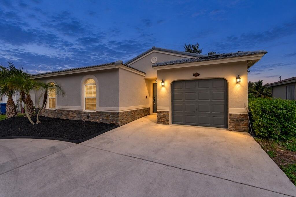 Photo of 1790 NW 56TH Avenue, Lauderhill, FL 33313 (MLS # B26084166)