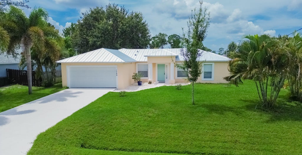 Photo of 1766 SW Capehart Avenue, Port Saint Lucie, FL 34953 (MLS # R11105620)