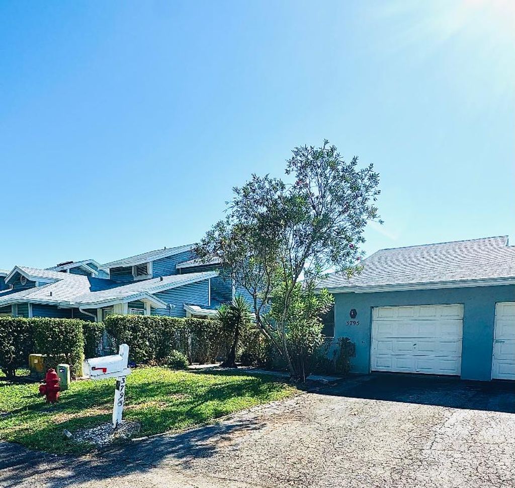 Photo of 3795 Island Club Circle E #10, Lake Worth, FL 33462 (MLS # R11150219)