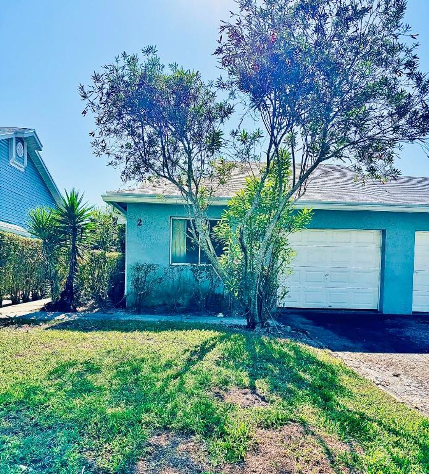 ATTENTION - FLIPPERS & INVESTORS - This is a quaint, all-ages community. The property needs some TLC, but once renovated, it will be a beautiful corner townhouse featuring one floor, 3 bedrooms, 2 bathrooms, and a lake view. Carpets have already been removed, making new flooring an easy next step. Private garage & pet friendly. The association fee includes Building Insurance(Exterior), lawn care, pool.