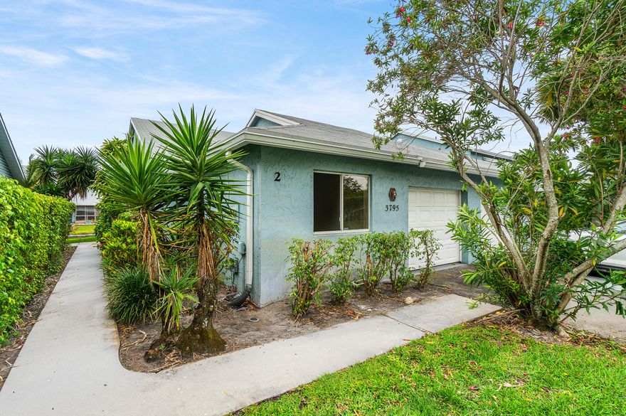 NEW RENOVATION -  NEW FLOORING, NEW KITCHEN, NEW BATHROOM VANITIES & TOILETS, FRESHLY PAINTED, NEW ROOF, GARAGE - Beautiful corner unit featuring 1 floor, 3 bedrooms, 2 bathrooms and a lake view. This is a quaint all-age community. Private garage & pet friendly. The association fee includes Building Insurance(Exterior), lawn care, pool.