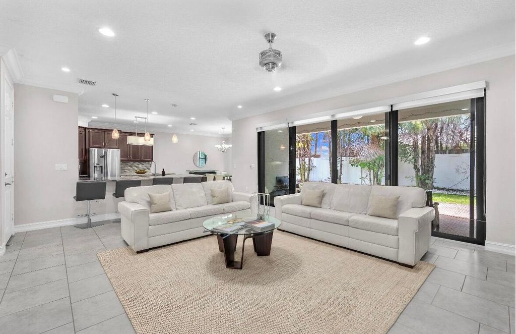 Photo of 8104 Rainforest Jasper Lane, Delray Beach, FL 33446 (MLS # B26043243)