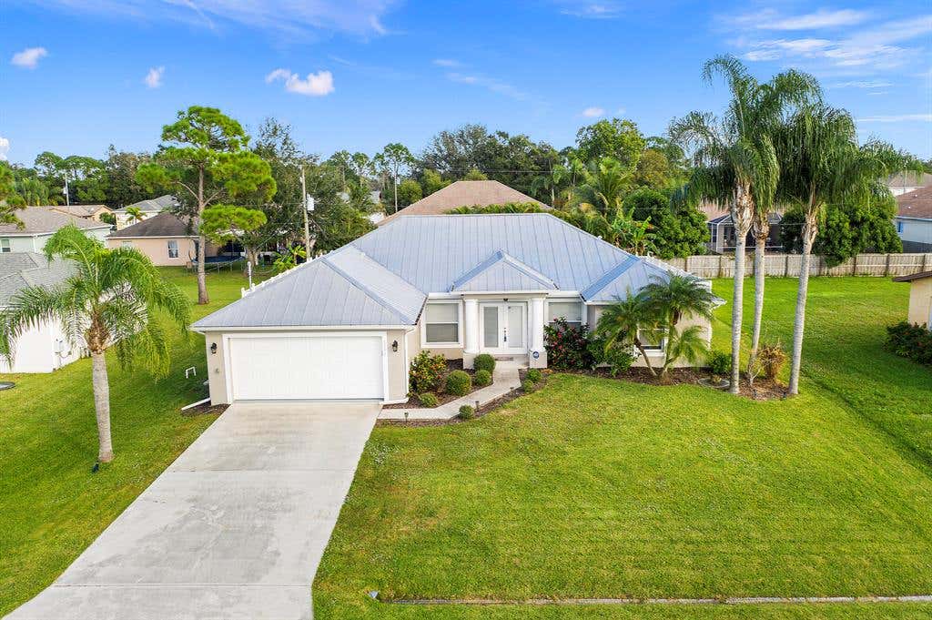 Photo of 1399 SW Hibiscus Street, Port Saint Lucie, FL 34983 (MLS # R10762598)