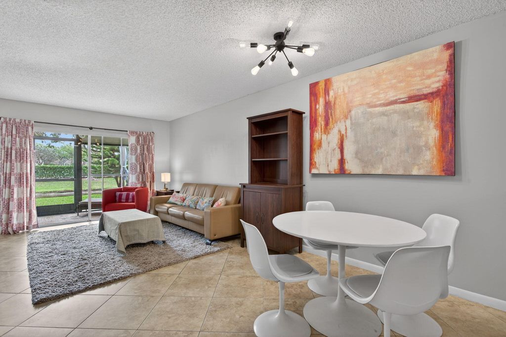 Photo of 2230 N Cypress Bend Drive N #104, Pompano Beach, FL 33069 (MLS # B26001019)