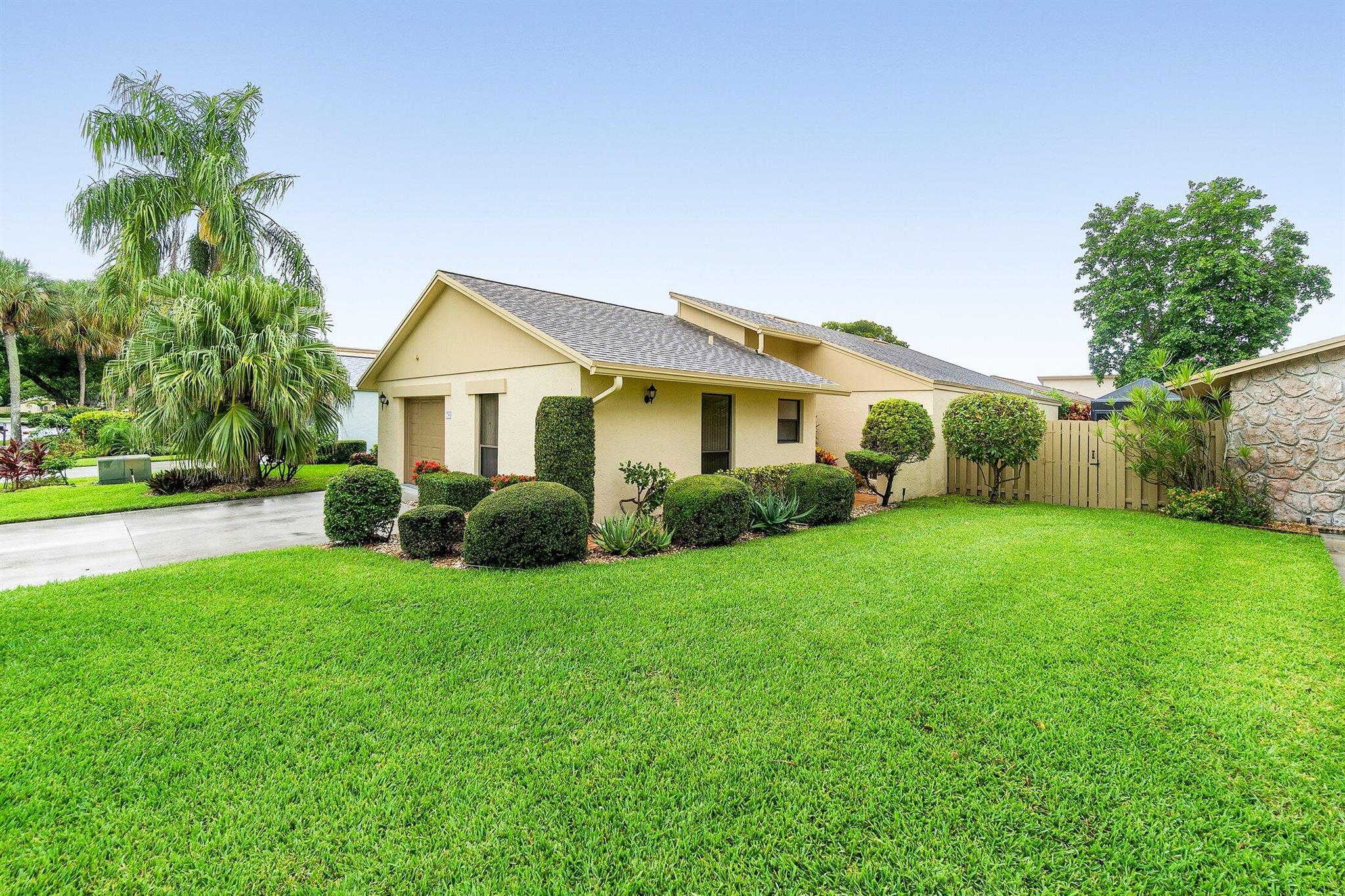 PRICED TO SELL! 2/2 SINGLE FAMILY HOME, Just under 1700 sqft.Welcome to this LIGHT-FILLED, FRESHLY PAINTED home in the highly sought-after 55+ community of RAINBERRY BAY in Delray Beach. Just under 1,700 SQ FT, this charming residence features soaring CATHEDRAL CEILINGS, multiple SKYLIGHTS, and a spacious FLORIDA ROOM with an adjoining tiled patio--ideal for entertaining.Primary suite includes a large WALK-IN CLOSET and en-suite bath with a separate vanity area. Updates include a CARRIER A/C (2017) with new ductwork, WATER HEATER (2016) and ROOF (2016) for added peace of mind. NO LEASE 2 YEAR HOLDEnjoy a vibrant lifestyle with 5 COMMUNITY POOLS, 12 CLAY TENNIS COURTS, PICKL