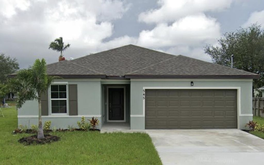 Photo of 545 SW Duval Avenue, Port Saint Lucie, FL 34983 (MLS # B26022570)